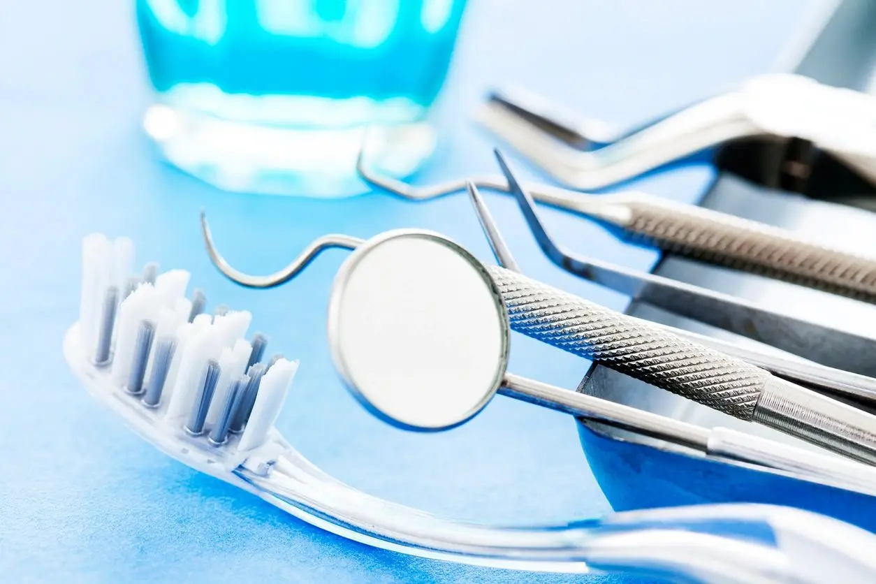 A close up of dental instruments on a table